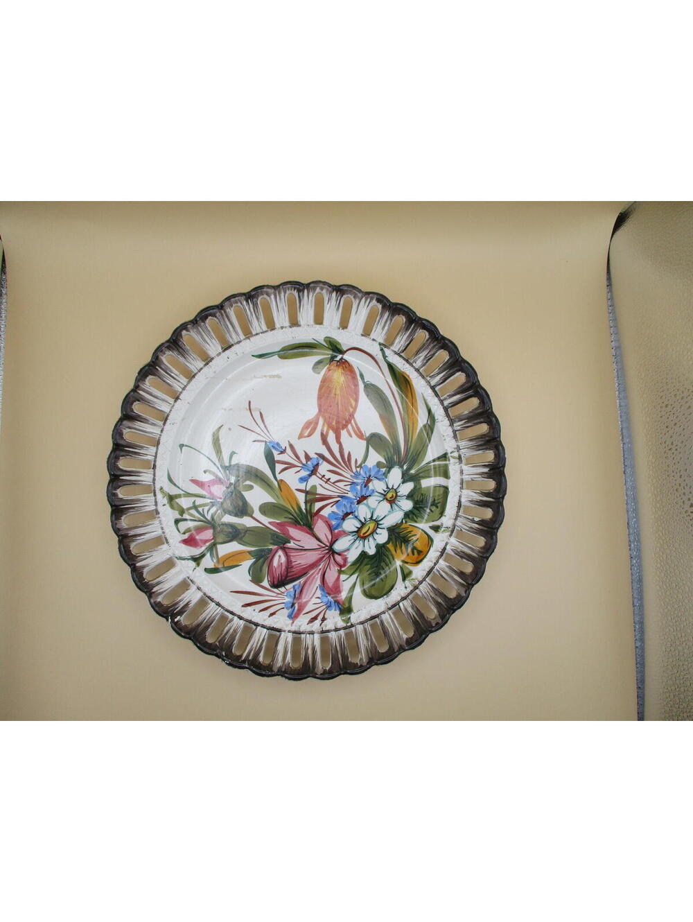 Vintage hand-painted Bassano ceramic plate with a pierced lattice rim.